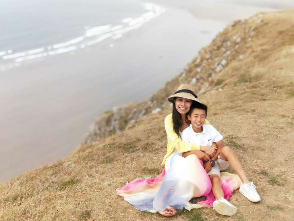 Hazel Lim and her son Noah on the beach